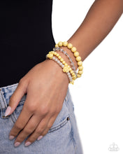 Load image into Gallery viewer, Rosy Retrospection - Yellow Paparazzi Bracelet
