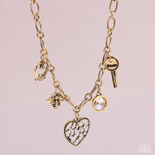 Load image into Gallery viewer, Reminiscent Reveal - Gold - Paparazzi Necklace
